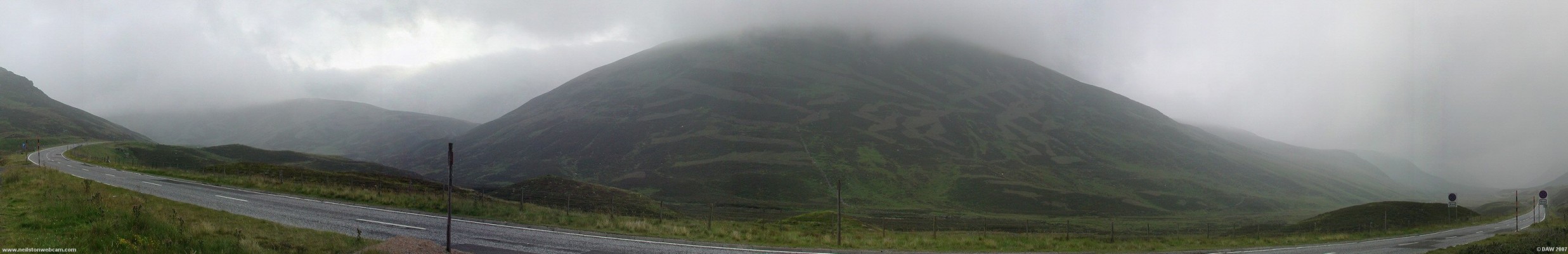 Near the Devils Elbow on the A93
It might not look like it but this is a summers day in August.  Its not difficult to imagine what it could be like in the winter, the snow poles and pile of road salt tell a story.  This is the highest public road in the UK reaching some 2199ft at its highest point.  Its the only route from the south to Glenshee ski slopes so every effort is made to keep the road open in winter. 
