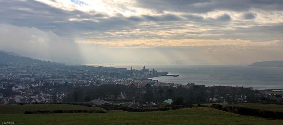 Overlooking Largs
A view over Largs and Largs Bay from the North on a cold winter morning.  The cranes of Hunterston Ore Terminal can be seen in the distance.  [url=http://www.streetmap.co.uk/map.srf?X=220135&Y=661135&A=Y&Z=115/] Map location. [/url]
