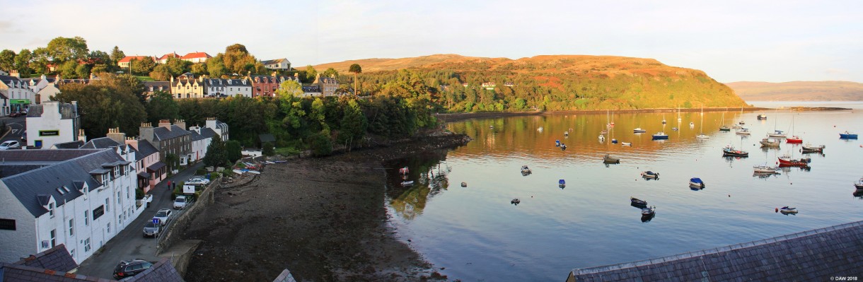 Portree, Isle of Skye
The last of the evening sun shines up Ben Chracaig opposite the harbour at Portree.  [url=http://streetmap.co.uk/map.srf?X=148392&Y=843355&A=Y&Z=115/] Map location. [/url]
