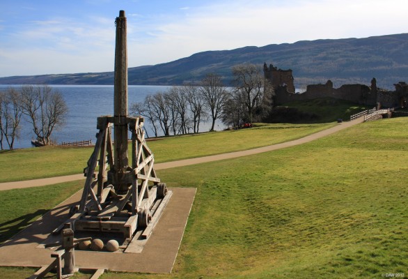 Siege Machine, Urquhart Castle
In 1296, Edward I of England invaded Scotland and laid siege to Urquhart Castle.  He used a machine similar to this replica to break down the Caste walls.  This particular Trebuchet is a copy of one from France and can throw 70kg stones up to 200m. [url=http://www.streetmap.co.uk/map.srf?X=252925&Y=828662&A=Y&Z=115/] Map location. [/url]
