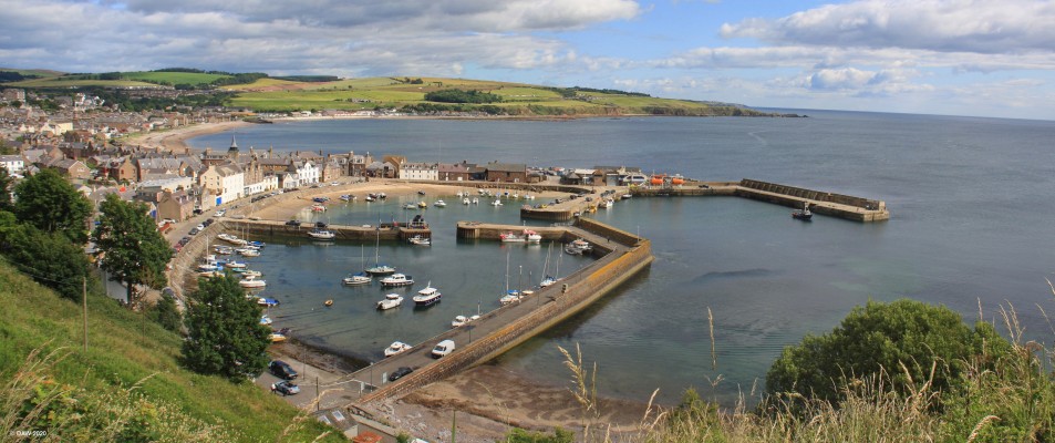 Stonehaven, Aberdeenshire
Overlooking the harbour area of Stonehaven.  The harbour you see today mostly dates from the 19th century although there was a harbour here as long ago as the 16th century.  It was built for a fleet of mainly Herring fishing boats.  That industry peaked around 1894 and today the harbour is used mainly for the mooring of pleasure craft and a few fishing boats. [url=http://streetmap.co.uk/map.srf?X=387792&Y=785137&A=Y&Z=115/] Map location. [/url]
