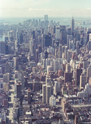 1st Avenue, New York City, 1989
A view from above Upper Manhatten looking south.  On the left is First Avenue taking a straight line down to the south end of Manhatten.  The Empire state is on the lright and the Twin Towers are in the centre in the distance.
