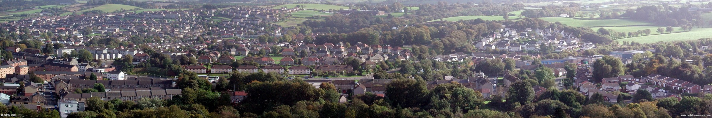 Panoramic view of Barrhead, 2006
Looking down over the western side of Barrhead.  Auchenback is spread along the hill on the left, you can also see St Lukes school near the centre top.  There are a few changes since this was taken in 2006, the main one being the demolition of the old Volvo factory on the extreme right hand side.  [url=http://www.streetmap.co.uk/map.srf?X=249187&Y=659197&A=Y&Z=115/] Map location. [/url]
