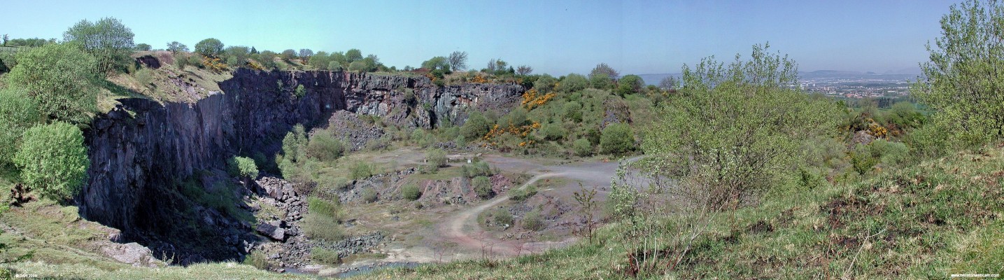 Boylestone Quarry, Barrhead
It is difficult to get an idea of scale from this photo, some of the large boulders you see in the quarry are the size of cars.  Copper was mined from volcanic rocks here in the 20th century, today it is a designated sight of special sceintific interest (SSSI).  [url=http://www.streetmap.co.uk/map.srf?X=249217&Y=659670&A=Y&Z=115/] Map location. [/url]
