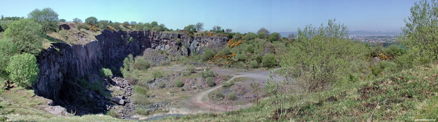 Boylestone Quarry, Barrhead
It is difficult to get an idea of scale from this photo, some of the large boulders you see in the quarry are the size of cars.  Copper was mined from volcanic rocks here in the 20th century, today it is a designated sight of special sceintific interest (SSSI).  [url=http://www.streetmap.co.uk/map.srf?X=249217&Y=659670&A=Y&Z=115/] Map location. [/url]
