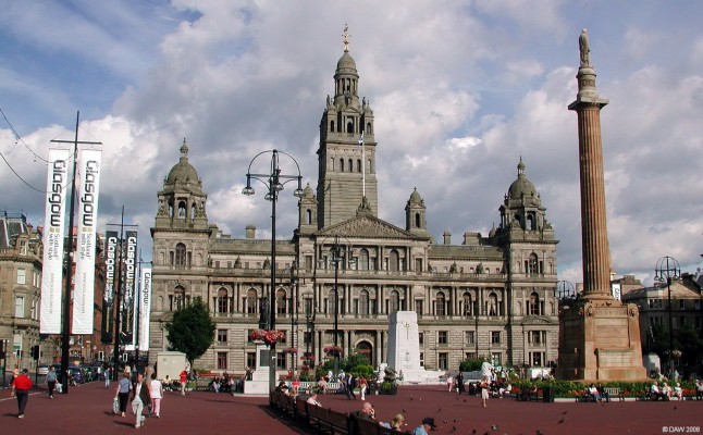 City Chambers, George Square, Glasgow
The foundation stone was laid in 1883 with a budget of �150,000, it was completed 5 years later at a total cost of �578,000. To this day the Council still has trouble with its sums :-)  The sandstone Column is the Sir Walter Scot Monumant.  [url=http://www.streetmap.co.uk/streetmap.dll?G2M?X=259260&Y=665410&A=Y&Z=1/]Map location. [/url]
