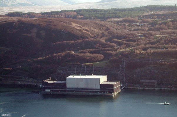 Explosives handling jetty, RNAD Coulport
This floating dock was built to enable the Royal Navy Trident submarines to be armed.  The raised roof covers the missile compartment allowing cranes to lift missiles in and out of the boats under cover and in secrecy.  It was built at Hunterston and floated the few miles to its present location.  The total weight of the structure is around 100,000 tons.  [url=http://www.streetmap.co.uk/map.srf?X=219602&Y=689957&A=Y&Z=115/] Map location. [/url]
