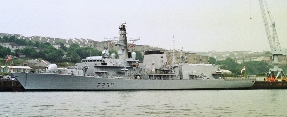 HMS Norfolk, F230, Plymouth 1994
Norfolk was the lead ship of the Type 23 Frigates.  She was built at Yarrow Shipbuilders in Glasgow and comissioned in 1990.  The type 23 had a new vertical launched Seawolf Anti-aircraft Missile System along with Harpoon antiship missiles and a 4.5 inch gun.  It also had a smaller compleiment of crew than previous Royal Navy frigates.  Norfolk only served for 15 years being a victim of defence cuts in 2005.

