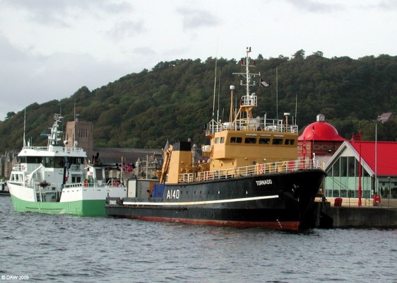 A140, MV Tornado, Oban
Tornado is a purpose built torpedo retriever operated by the Royal Maritime Auxiliary Service. She was built in 1979  by Hall Russell in Aberdeen and dsiplaces some 560 tons.  She is based on the Clyde but will often be seen up the west coast since this is where the Royal Navy trains its submarine crews.  [url=http://www.streetmap.co.uk/map.srf?X=186070&Y=731380&A=Y&Z=120&ax=185755&ay=729930/] Map location. [/url]
