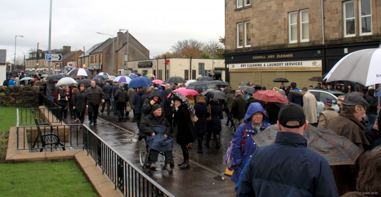 A sea of umbrellas, War Memorial dedication, Neilston, Nov 2015
Despite the poor weather there was a large turn out to see the new War Memorial dedicated on 7th Nov 2015 on Neilston Main Street.
