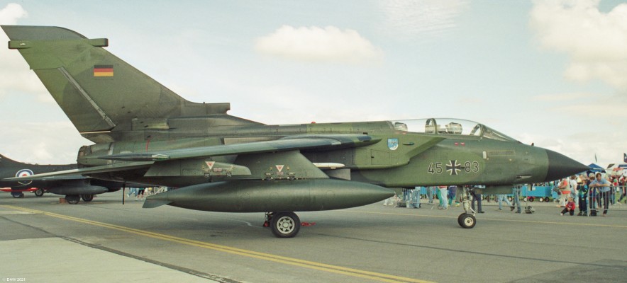 Panavia Tornado, Fairford, 1993
The Tornado was developed by the UK and Germany and first entered service in 1979.  It is a twin engined multirole aircraft with variable geometry wings.  For many years its varients were the backbone of the RAF with nearly 1,000 being built and operated by several countries.  The Tornado was retired from the RAF in 2019.
