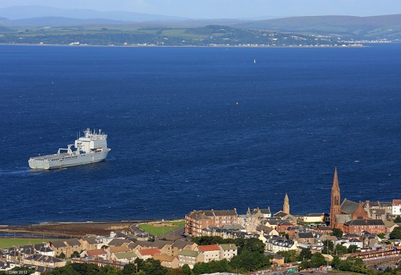 RFA Largs Bay, Largs Bay
Largs Bay on her last visit to Largs before being sold to Australia.  She displaces some 16,000 tons and can carry 1150 linear metres of vehicles.  Three sister ships remain in service with the Royal Navy.  [url=http://www.streetmap.co.uk/map.srf?X=221411&Y=658516&A=Y&Z=120/] Map location. [/url]

