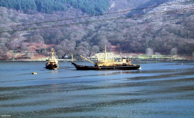RMAS Salmoor, A185, Loch Goil
A185 and friend in Loch Goil in 2003.  Salmoor was built by Hall Russell in 1985 and is purpose built for maintaining moorings and Buoys.  Loch Goil has a designated 'Z-Berth' which means it is approved for mooring Nuclear Submarines.  Loch Goil is also the home of a listening range where RN vessels are checked for their noise signiature.  [url=http://www.streetmap.co.uk/map.srf?X=219564&Y=697345&A=Y&Z=120/] Map location. [/url]
