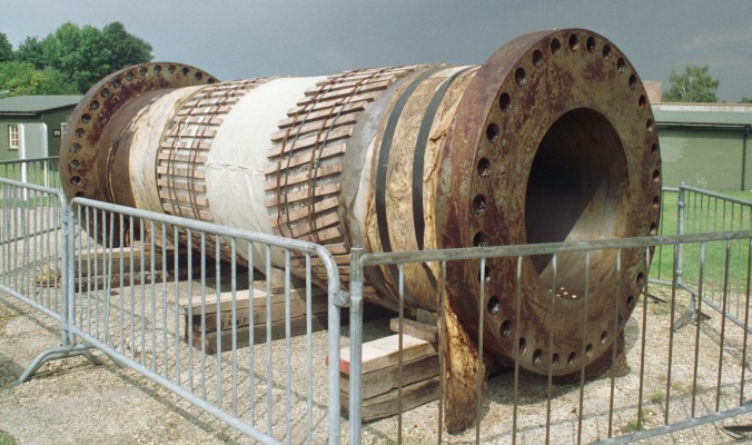 Iraqi Supergun segment, Duxford, 1992
A segment of the Iraqi supergun.  This was a project that Saddam Hussein started in 1988 to build a series of "superguns".  The design was based on research done in the 1960 Project HARP led by Canadian artillery expert Gerald Bull.  The project came to an end when Bull was assasinated in 1990.  Many parts were built in the UK by Sheffield Forgemasters and others. 
