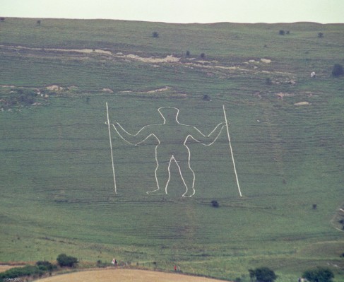 The Long Man, Wilmington, Sussex, 1992
Formerly thought the be of ancient origon a 2003 archaeological invesigation found that the figure is more likely to have been cut in the 16th or 17th century.  From a distance it looks like it is cut in to chalk but the reality today is that is is painted breeze blocks and lime mortar.  The figure is 72m tall.
