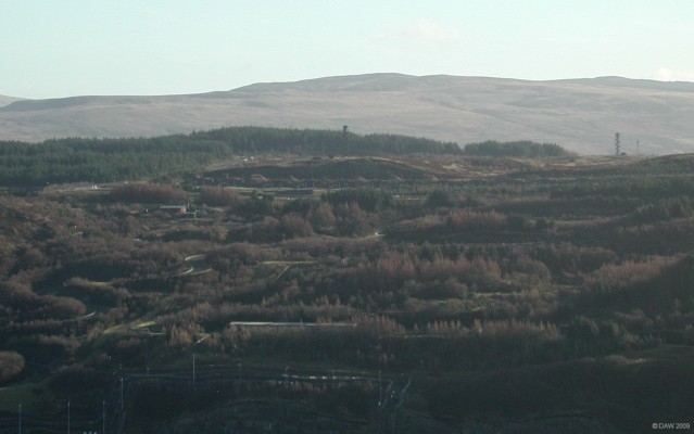 Trident warhead bunkers, RNAD Coulport
Just below the watch tower in the centre of this photo you can see the bunkers built to hold the warheads for the Royal Navy Trident missile submarines.  There are 16 in total, although the warheads are built and maintained in the UK the Trident missile are taken from the US navy 'pool' of missiles and also serviced in the US, it does beg the question as to how 'independant' our independant 'deterrant' is.
