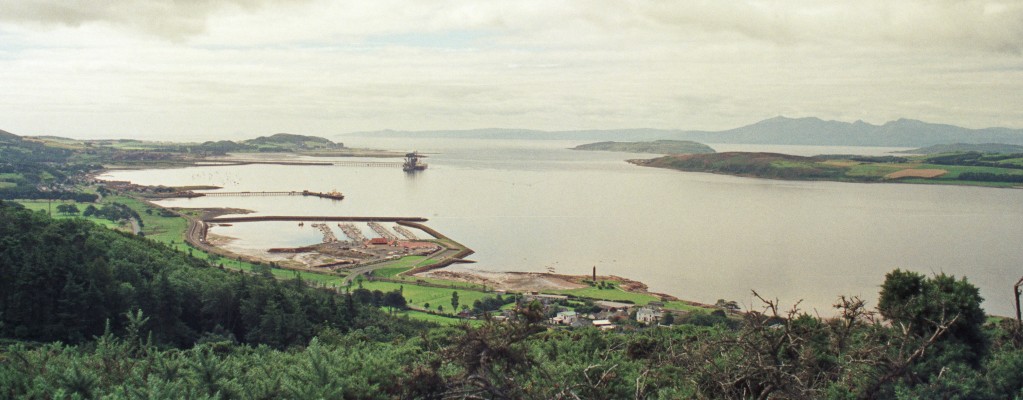 The view from Douglas Park, Largs, 1988
A view looking south west from the top of Douglas Park in Largs.  A snapshot in time from when the Largs Marina was still being constructed, the NATO jetti at Fairley was still in use and the Hunterston Ore Terminal was also still in use in the distance. The Islands on the right are, the Great Cumbrae, The Wee Cumbrae, Bute and Arran in the distance. [url=http://streetmap.co.uk/map.srf?X=221441&Y=658506&A=Y&Z=120/] Map location. [/url]
