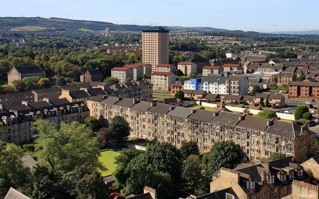 Walker Street Tenemants, Paisley
A view of old and new housing in Paisley.  The Walker Street tenemants dominate the picture with Victoria Bowling Green behind.  In the centre left is the former Canal Street Church where the Poet Robert Tanahill's grave can be found.  In the distance are the Gleniffer Braes.  [url=http://www.streetmap.co.uk/map.srf?X=247802&Y=663964&A=Y&Z=115/] Map location. [/url]
