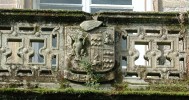 Coat_of_Arms_above_entrance,_Dunlop_House.jpg